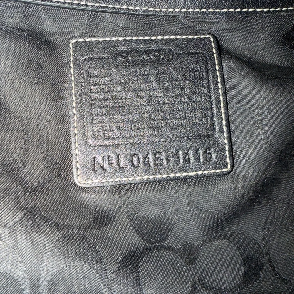 Vintage Coach Legacy 1415 Slim Duffle shoulder Bag in black with white stitching